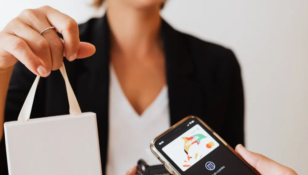Account updater service affecting costs on a recurring-payment merchant statement.