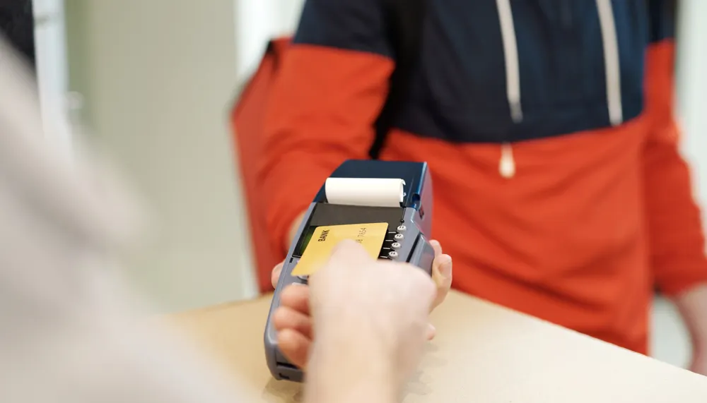 Merchant sales and card brand fees changing at different rates from month to month.