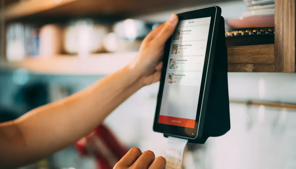 Commercial card transaction using enhanced invoice data to avoid a costly downgrade.