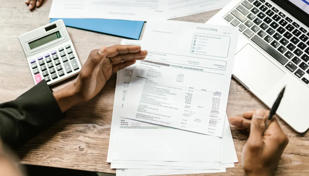 OCR extracting numbers from a merchant statement before a human analyst interprets the pricing.