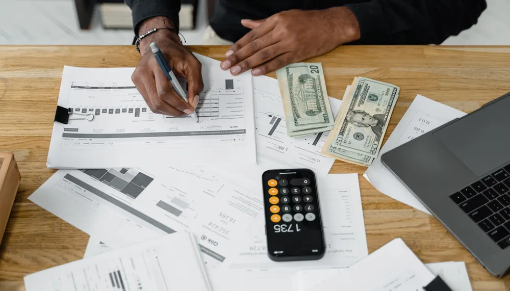 Pass-through merchant processing statement with processor margin layered above interchange costs.