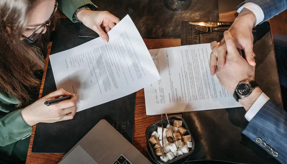 Two merchant statements that look similar by percentage but differ in total fee structure.