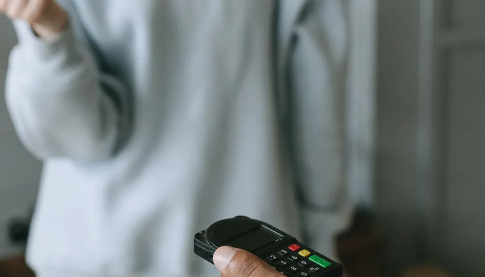 Regulated and exempt debit transactions following different cost paths on a merchant statement.
