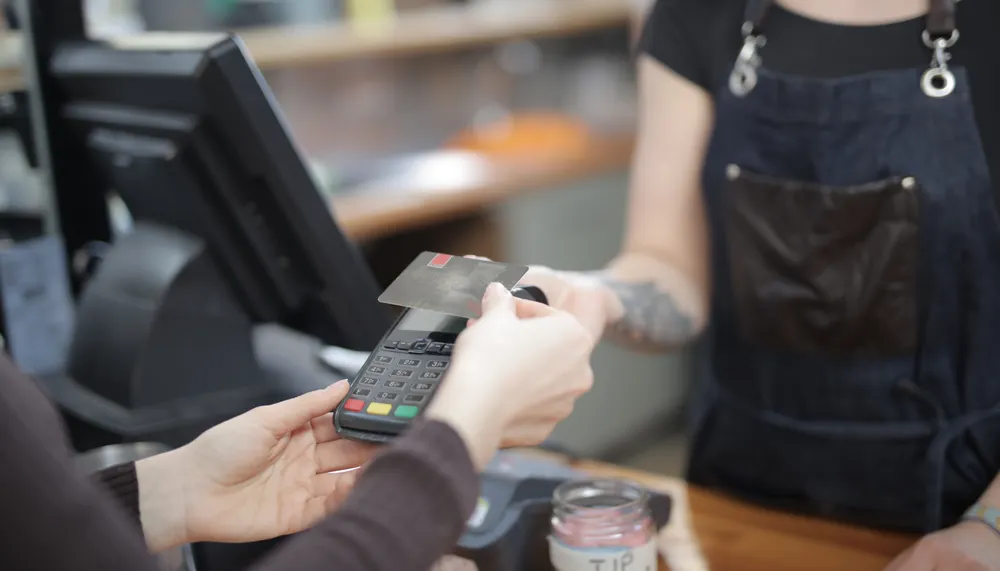 Rewards card mix increasing merchant cost while processor markup remains unchanged.