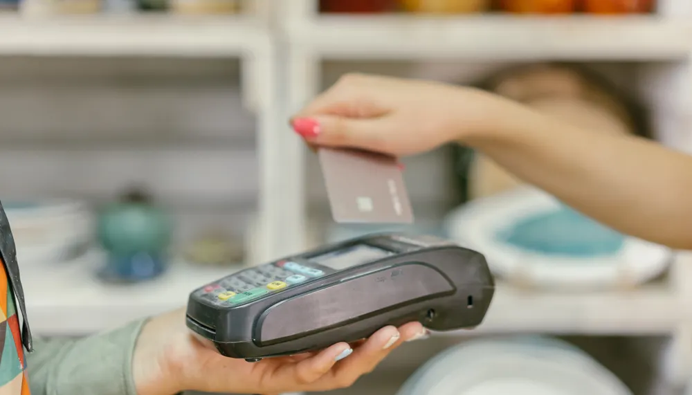 Two merchant statements showing a changing Visa network fee while processor pricing remains unchanged.