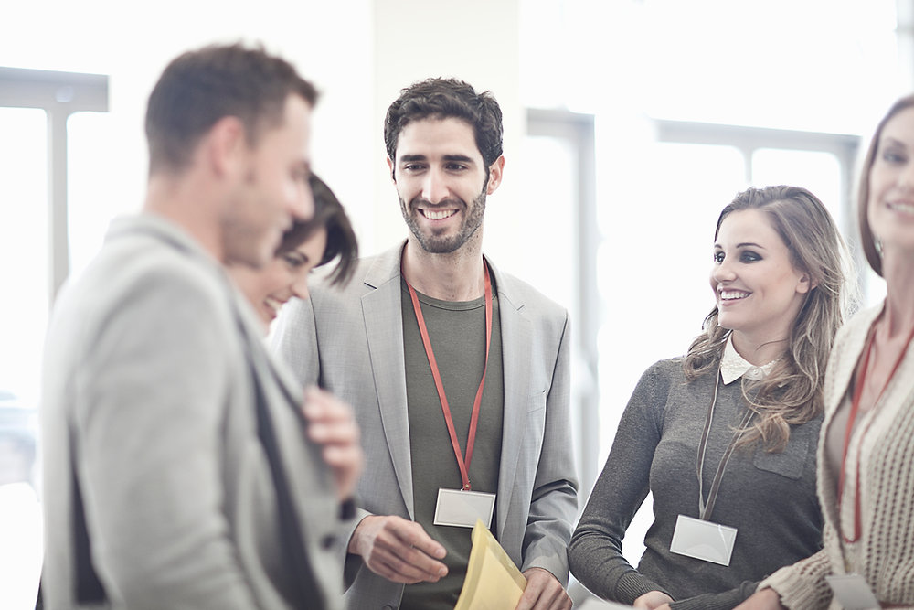 Professionals discussing tailored merchant account solutions